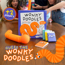 Load image into Gallery viewer, Lucky Egg Wonky Doodles – Hilarious Drawing Games for Family Game Night &amp; Parties – Family Board Games for Adults with Wonky Doodler, 150 Word Cards &amp; Whiteboard – Best Family Games for Ages 8+
